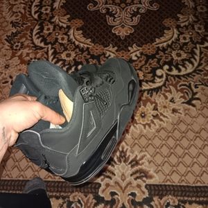 Jordan 4s black cats